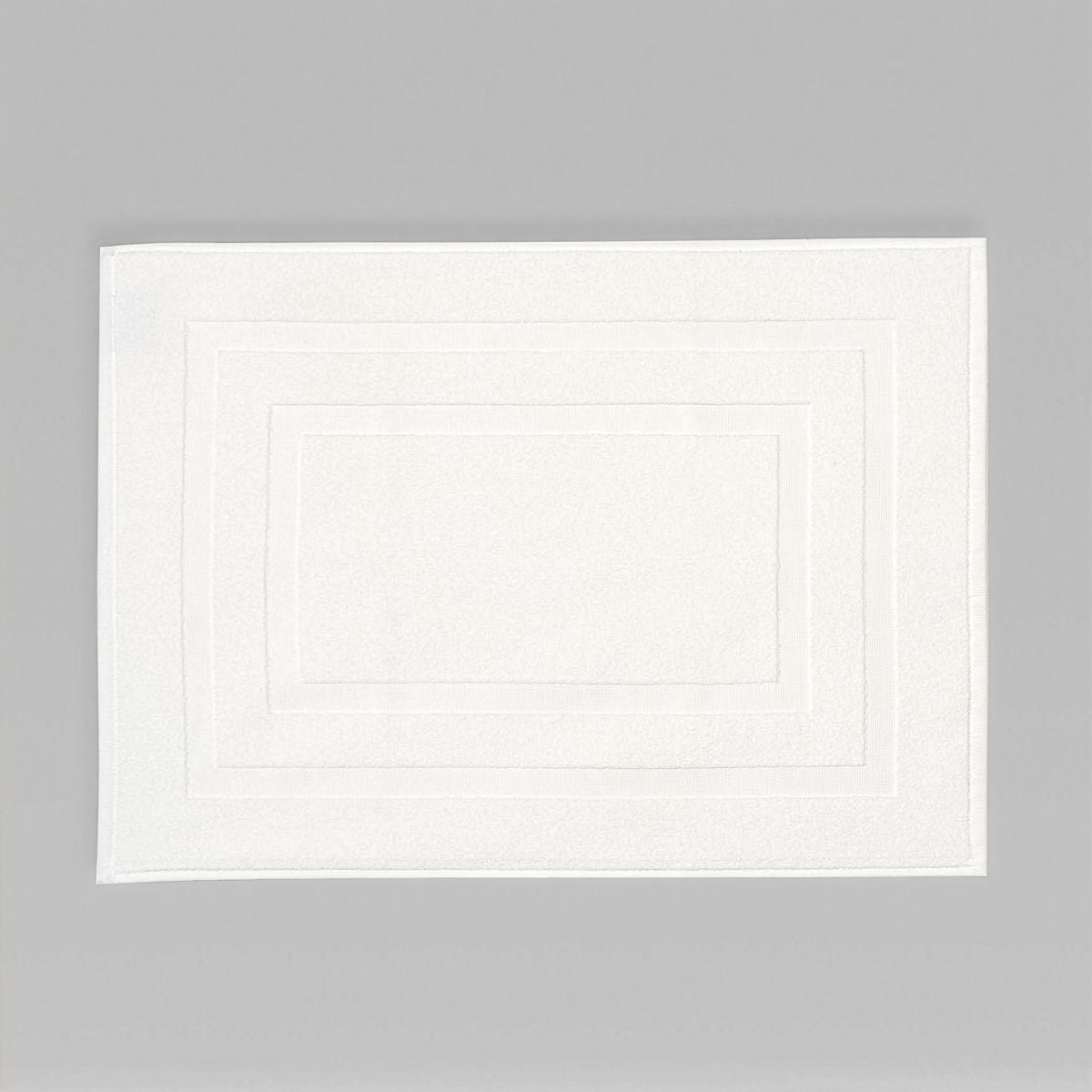 Tapis de bain en coton peigné bouclette 620 gsm